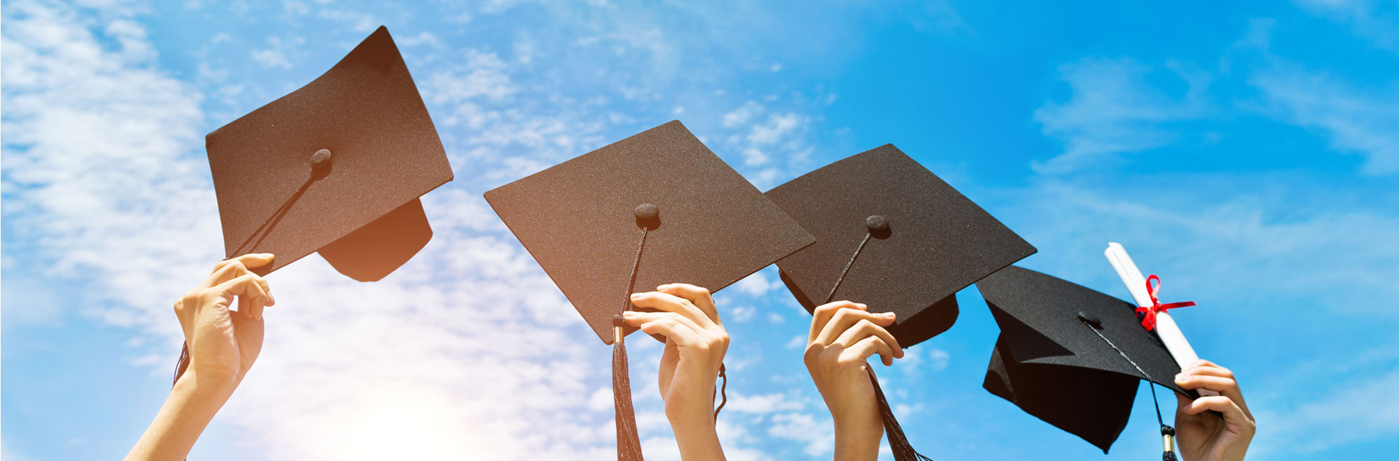 lauderdaleco_teachers_fcu_grad graduation caps